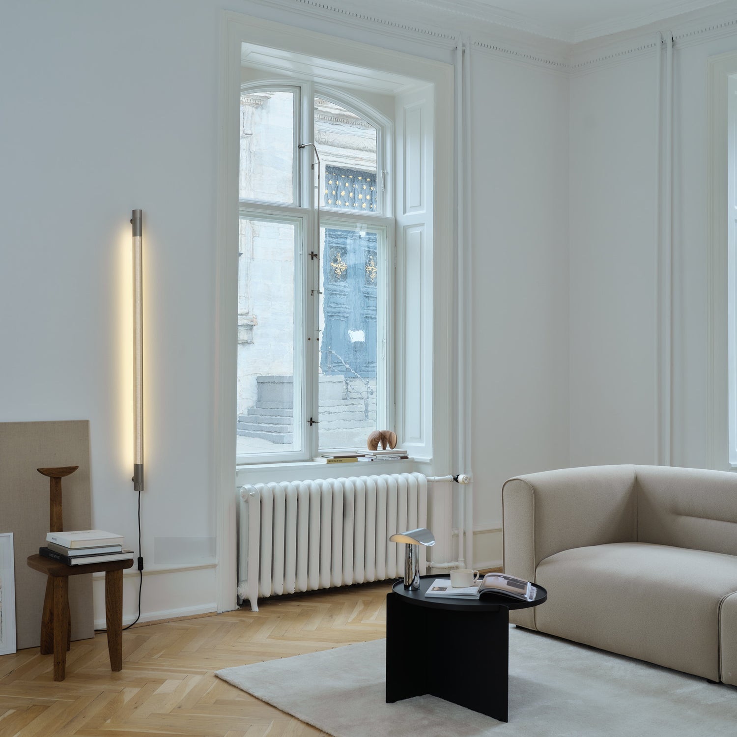 Radent væglampe lang stål